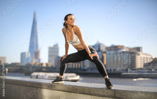 Sportive girl challeging herself, training in the street