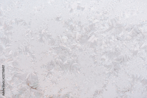 Background ice on the glass. Frost. The texture of frost. The glass is frozen.