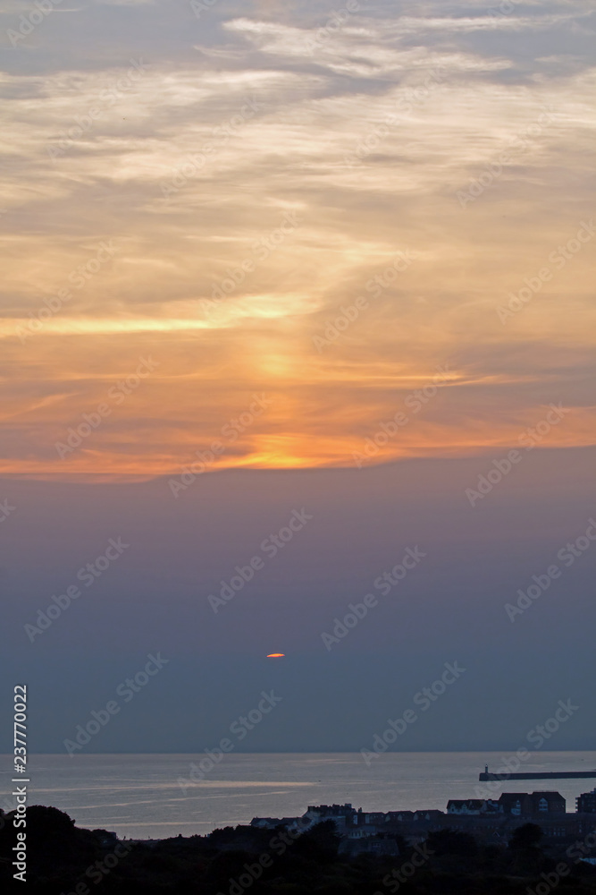 Sunset and Sun Pillar over Seaford Bay