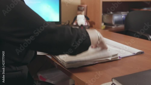 A Woman Going Through Documents & Paperwork