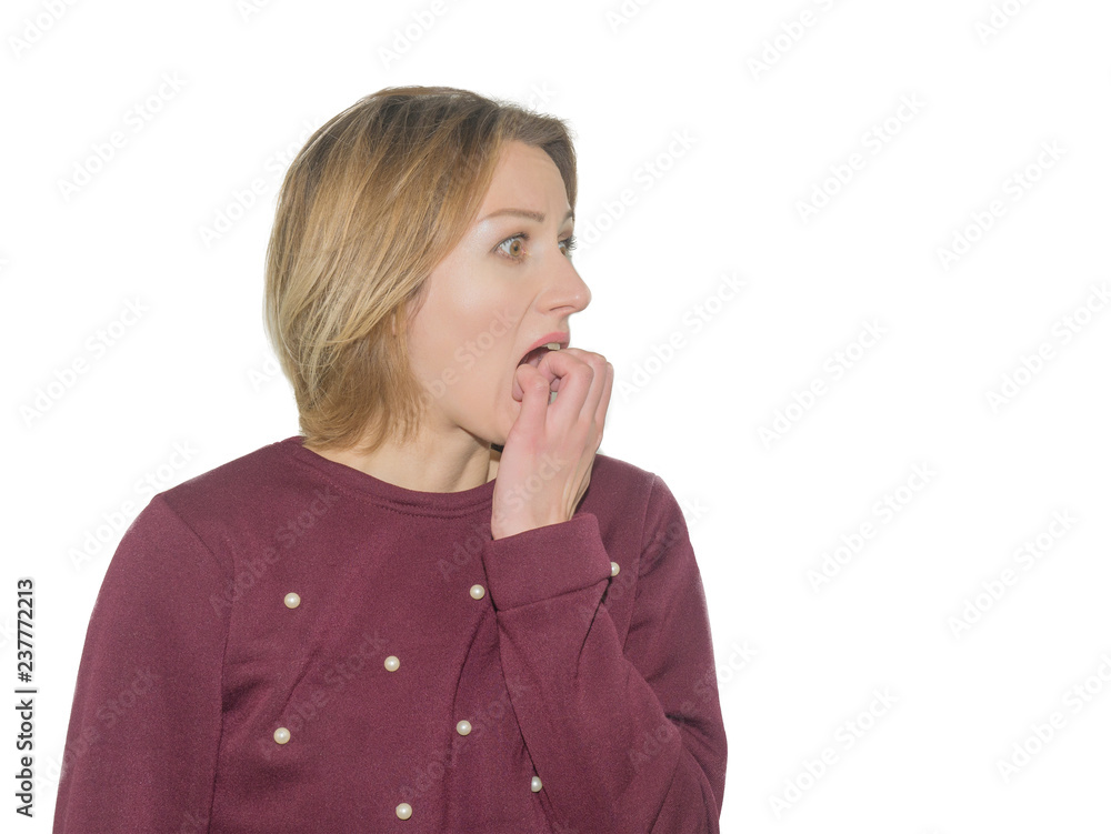 Portrait of a nervous girl biting her nails, isolated over white background Portrait of a nervous girl biting her nails, isolated over white background