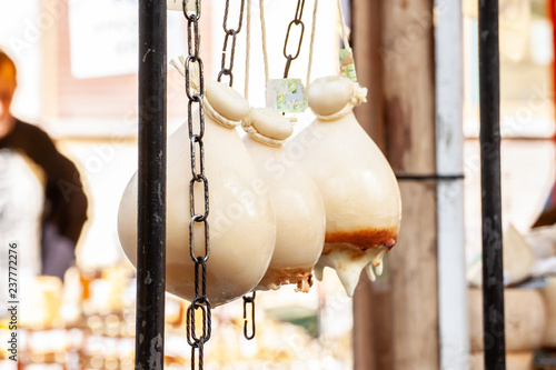 Fotografie hanged caciocavallo, traditional Italian cheese