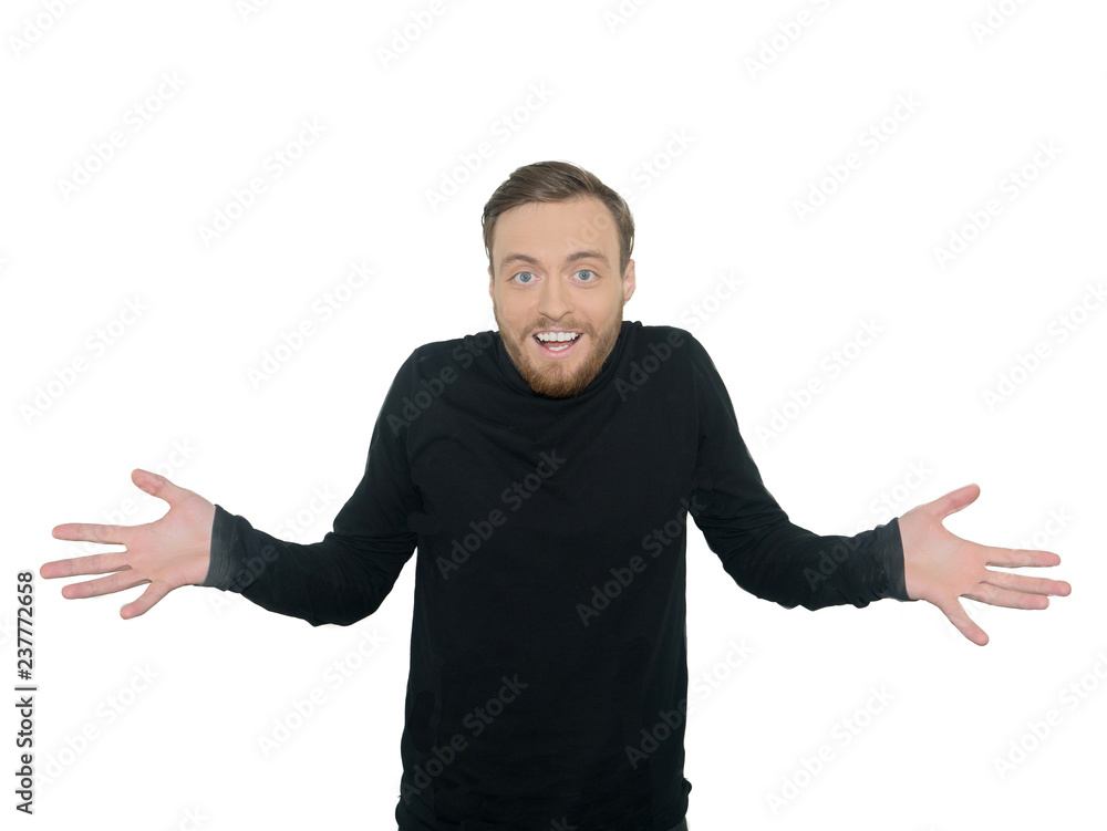 Portrait of an excited man standing with raised hands and looking at camera isolated on a white background Portrait of an excited man standing with raised hands and looking at camera isolated on a white background