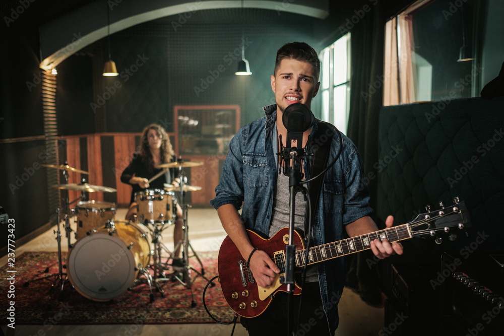 Fototapeta premium Music band having rehearsal