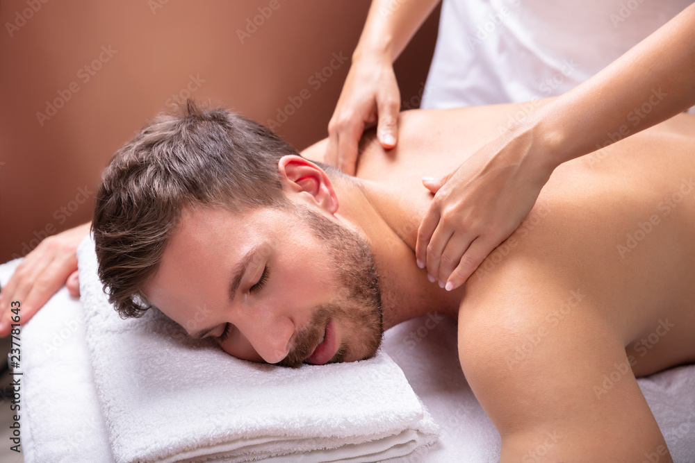Man Receiving Shoulder Massage Man Receiving Shoulder Massage