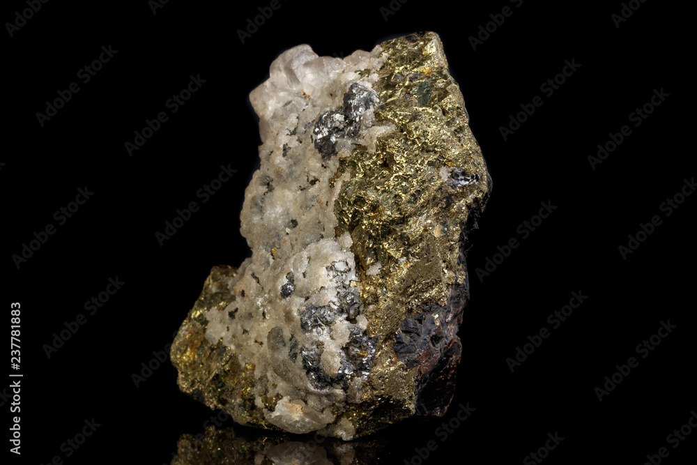 Macro of a mineral stone Sphalerite with fluorite and pyrite on a black background close up Macro of a mineral stone Sphalerite with fluorite and pyrite on a black background close up