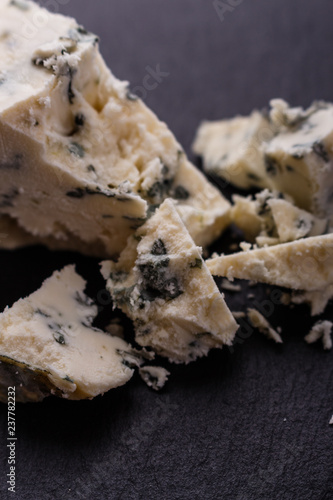 delicious blue cheese on wooden rustic background