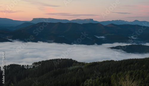 Fototapeta Naklejka Na Ścianę i Meble -  Mountains of Bizkaia at sunrise from Mount Ubieta