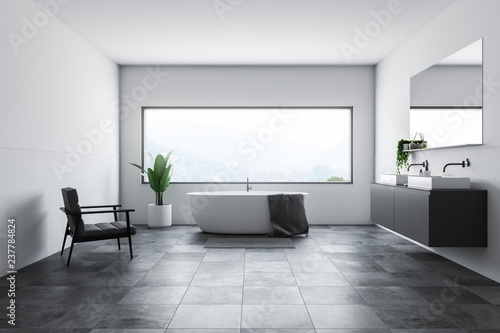 White bathroom interior, tub and sink