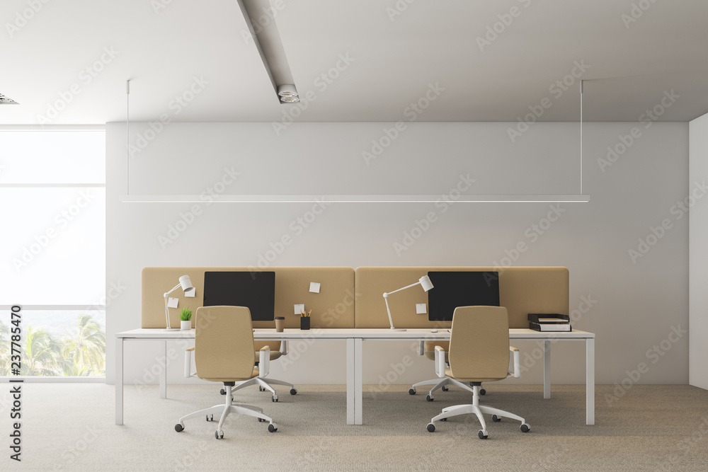 White office interior with beige tables