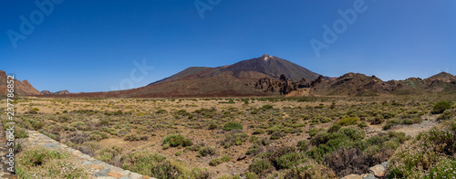 Panoramic view of the lava fields of Las Canadas caldera of Teide volcano. Tenerife. Canary Islands. Spain. View from the observation deck - "Mirador Boca Tauce".