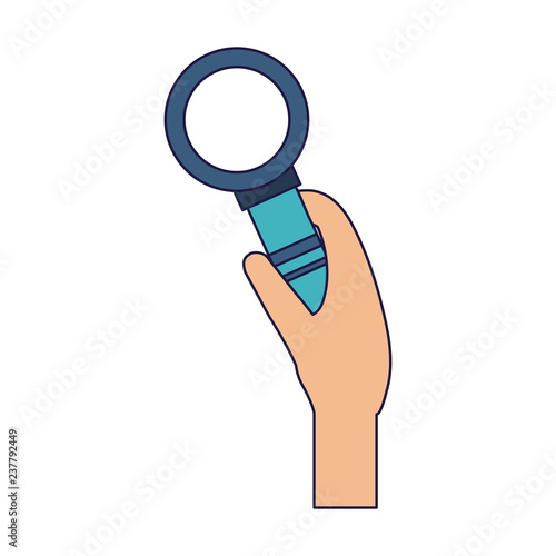 Hand with magnifying glass photo