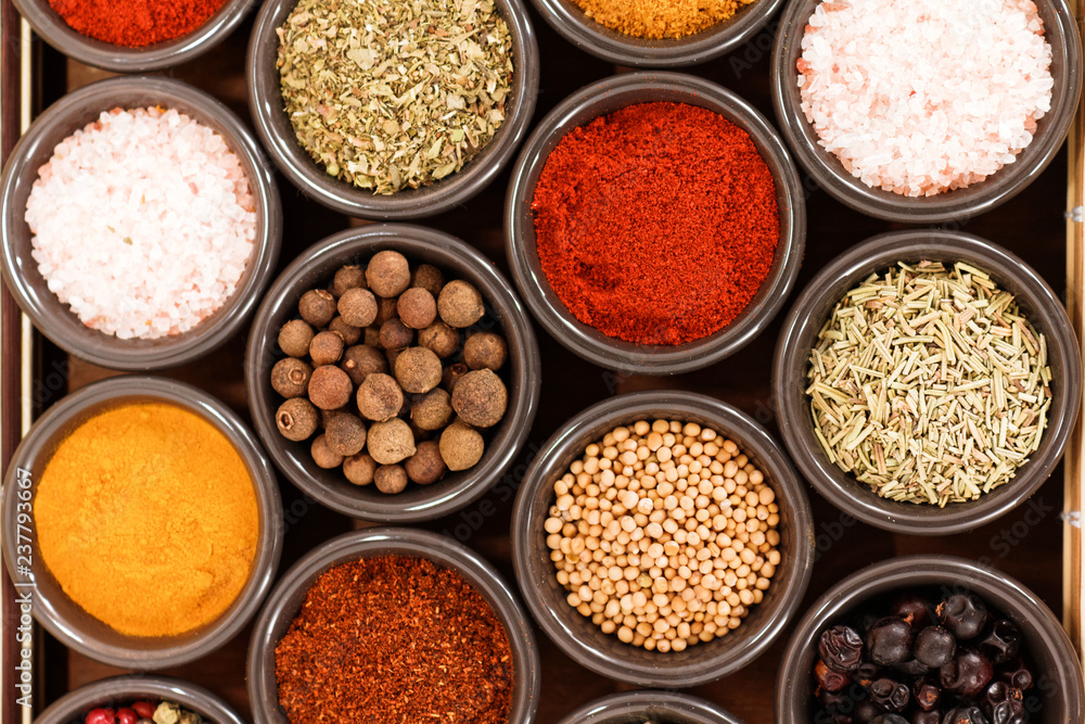 Herbs and spices on a wooden background
Herbs and spices on a wooden background