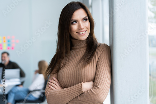 Modern business woman in the office with copy space.