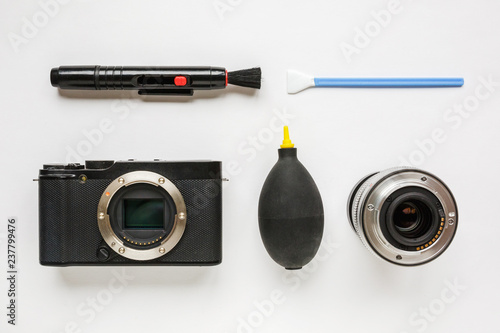 professional tools for digital APS-C dirty camera matrix sensor cleaning on white background photo