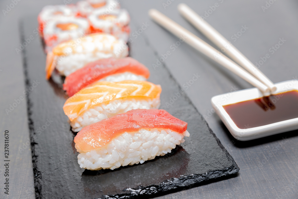Sushi, a typical Japanese food prepared with a base of rice and various raw fish such as tuna, salmon, shrimp and sea bream. To which is added, according to the variants. Sushi, a typical Japanese food prepared with a base of rice and various raw fish such as tuna, salmon, shrimp and sea bream. To which is added, according to the variants.