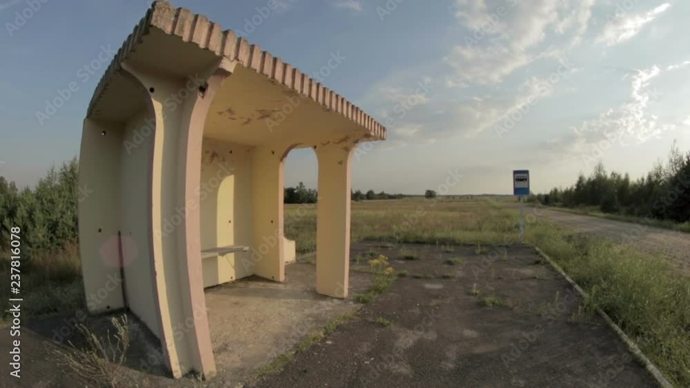 Lonely bus stop in the field, panoramic wide view on the fisheye lens Lonely bus stop in the field, panoramic wide view on the fisheye lens