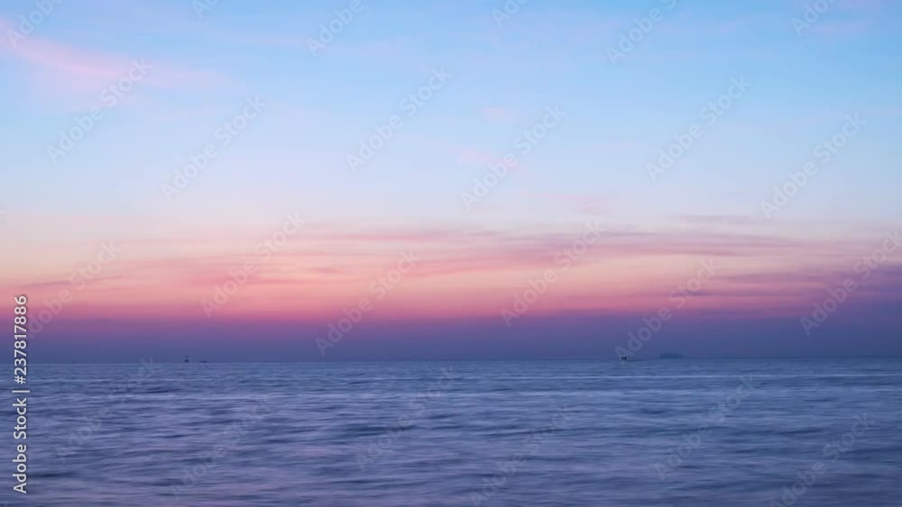 Time lapse of Night to Day beautiful light sunrise or sunset over sea beautiful light of nature dramatic sky and clouds flowing in the sky Time lapse of Night to Day beautiful light sunrise or sunset over sea beautiful light of nature dramatic sky and clouds flowing in the sky