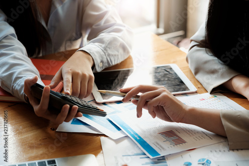 Asian business adviser meeting to analyze and discuss the situation on the financial report in the meeting room.Investment Consultant,Financial advisor and accounting concept photo