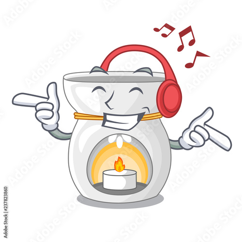 Listening music aroma lamp with burning candle mascot