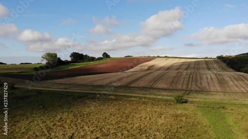 Aerial view of golden fields with brown mold close to Sejer√∏bugten in Odsherred. photo