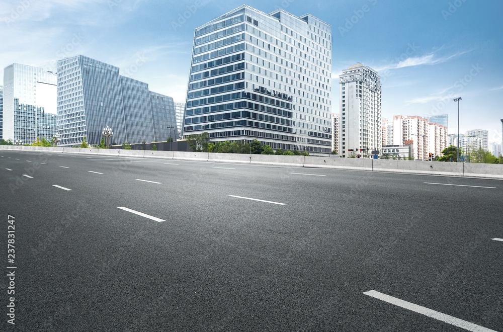 The expressway and the modern city skyline are in chengdu, China. The expressway and the modern city skyline are in chengdu, China.