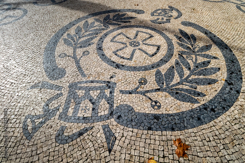 A variety of patterns of paving slabs on the pedestrian zones of Lisbon. Portugal in Autumn