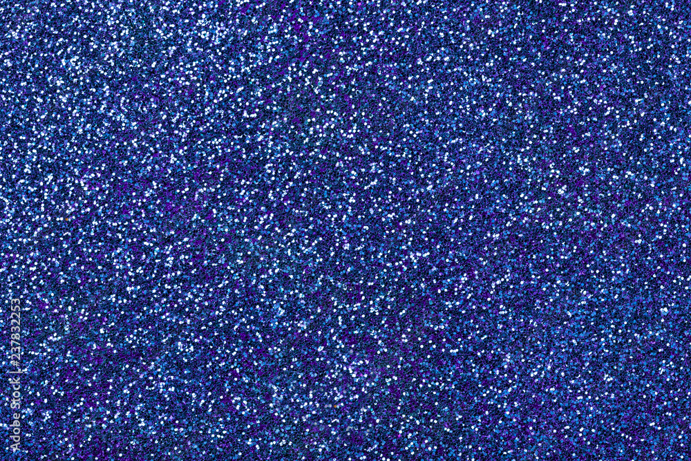 Obraz premium Navy blue sparkling background from small sequins, closeup. Brilliant backdrop.