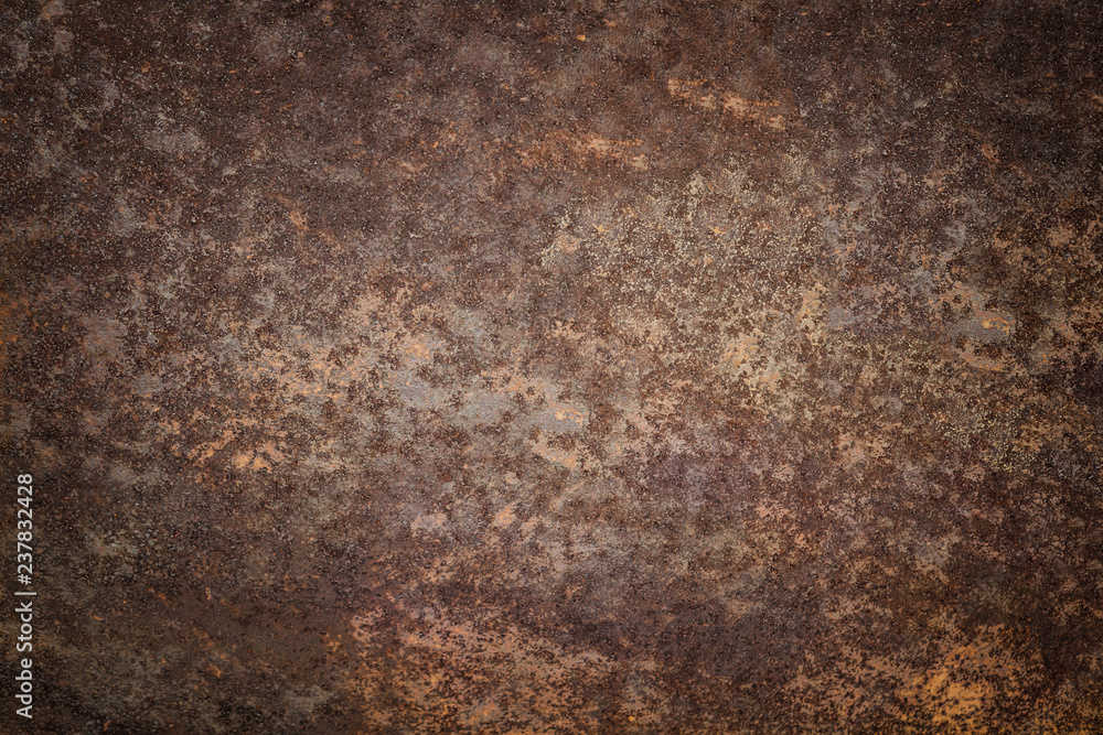 Dark worn rusty metal texture background. Vintage effect.