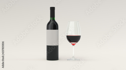 Bottle of red wine and a glass