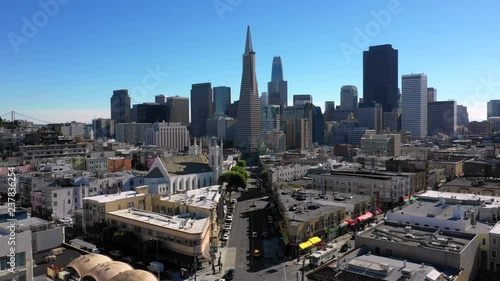 4K Aerial clip approaching downtown san francisco and the transamerica pyramid during a blue sky day photo