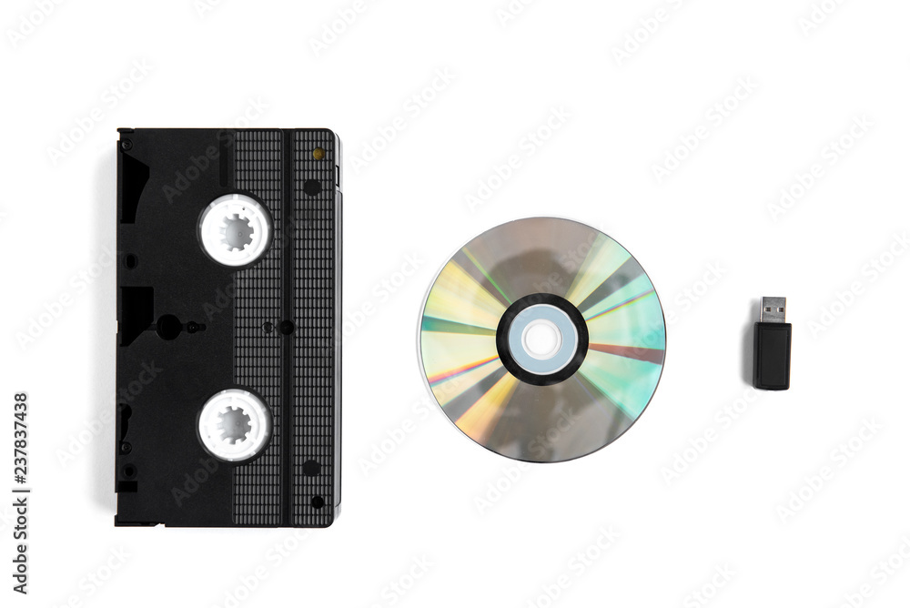 Videocassette and disc isolated on white background. Videocassette and disc isolated on white background.