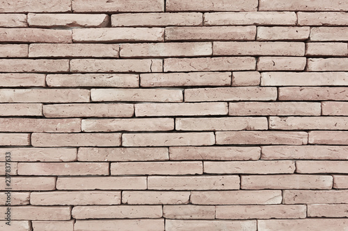 Brown brick wall as a background or texture