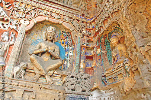 Buddha statues of Yungang Grottoes   The World cultural heritage site  Famous  Buddhist Caves Art Treasure Houses  in Datong  Shanxi Province  China. World heritage site. Selective focus.