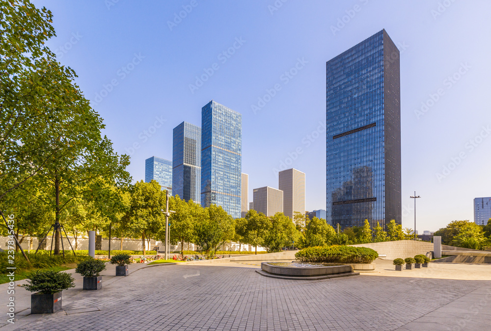 Obraz premium buildings with empty concrete square floor，Qianjiang New Town，hangzhou,china