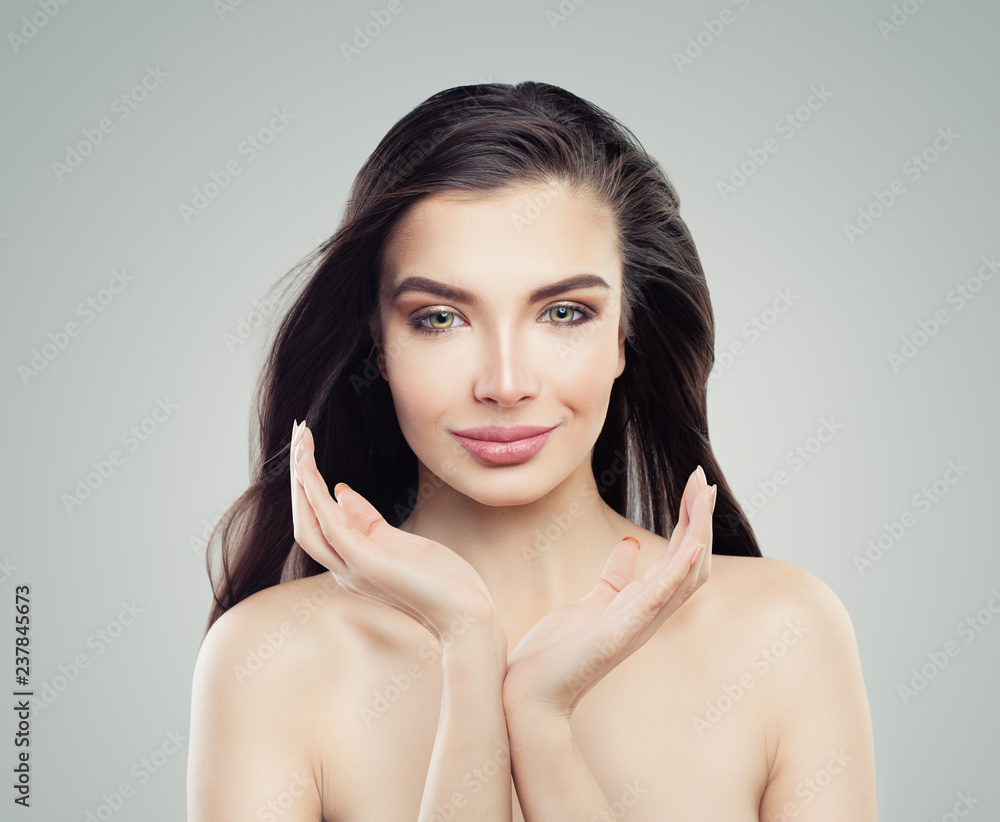 Happy young model woman. Female face with perfect skin Happy young model woman. Female face with perfect skin