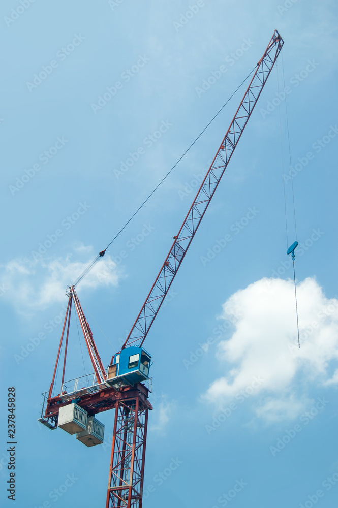 Crane on blue sky