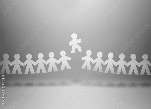 Member of team standing out from the crowd with grey background