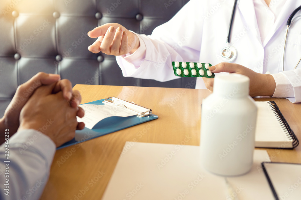 doctor explaining patient symptoms or asking a question doctor explaining patient symptoms or asking a question