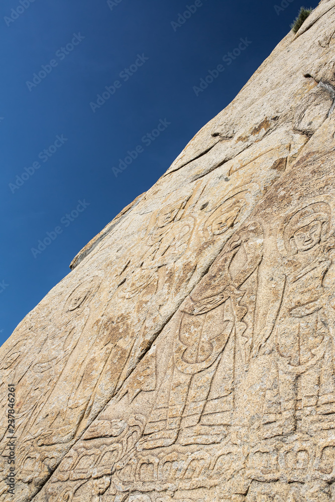 Old buddhist carving on the wall of Shey Palace complex in Ladakh region, India. Old buddhist carving on the wall of Shey Palace complex in Ladakh region, India.