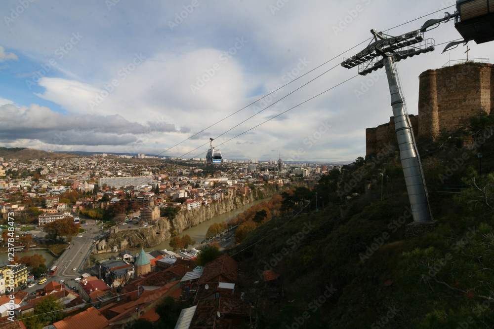 Fototapeta premium View of the city and cable car in Tbilisi, Georgia.