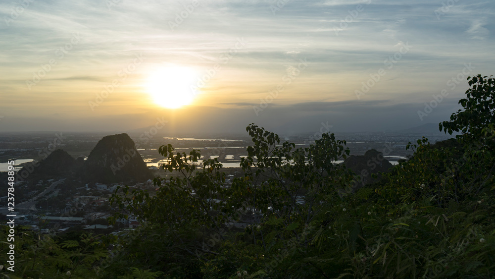Beautiful sunset in the Marble mountains in Da Nang ,charming view for the city,jungle and sea,travel concept.
