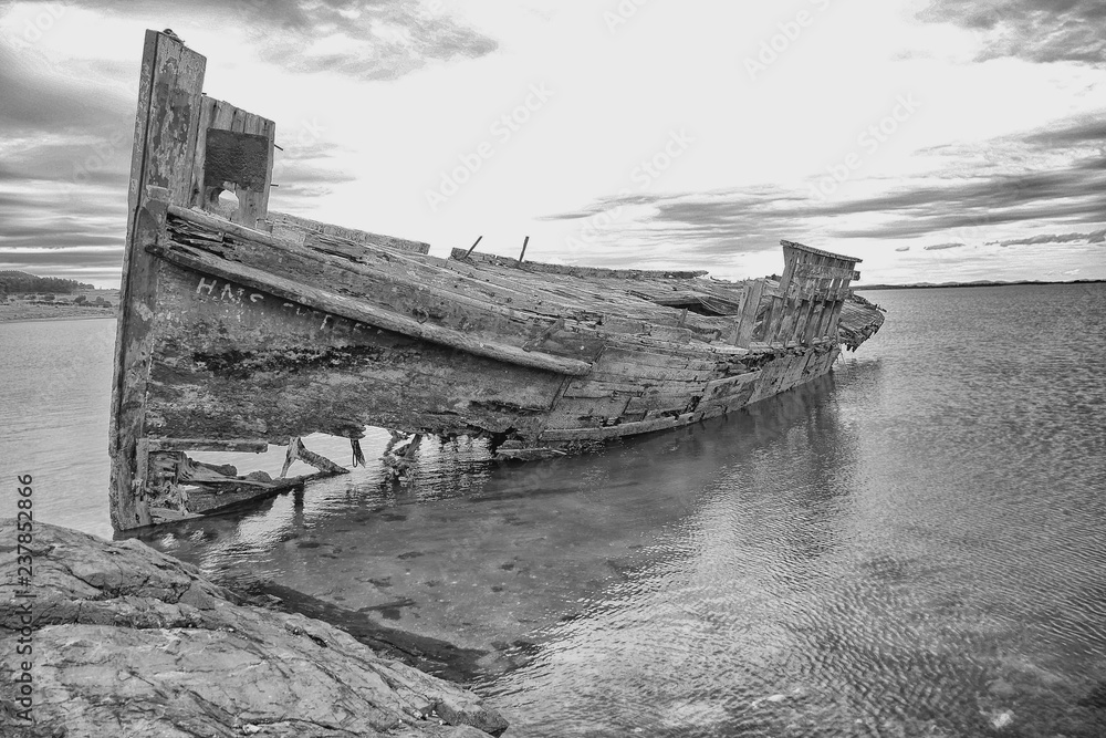 New Zealand sailing shipwreck on the rocks