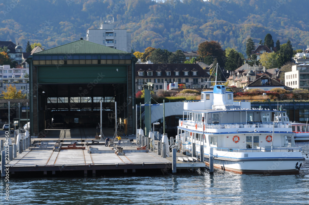 The wharft of the Lake Zürich cruise ships in Wollishofen Stock Photo