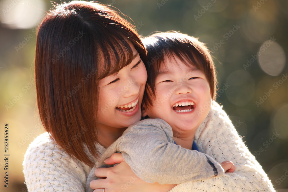 Obraz premium 笑顔の親子