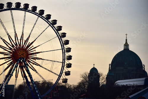 Ferris Wheel in Berlin with booths at the Christmas Fair.