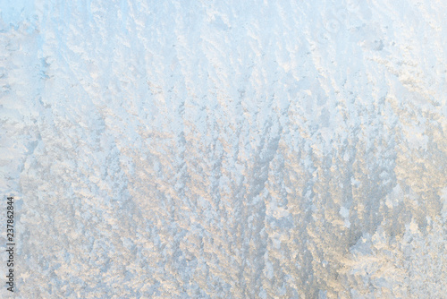 background ice, frozen window covered with frost, abstract silver texture, winter, cold
