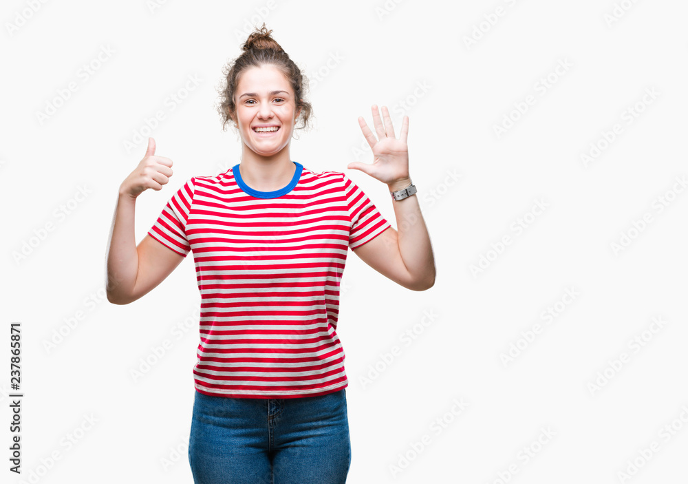 Beautiful brunette curly hair young girl wearing casual look over isolated background showing and pointing up with fingers number six while smiling confident and happy. Beautiful brunette curly hair young girl wearing casual look over isolated background showing and pointing up with fingers number six while smiling confident and happy.