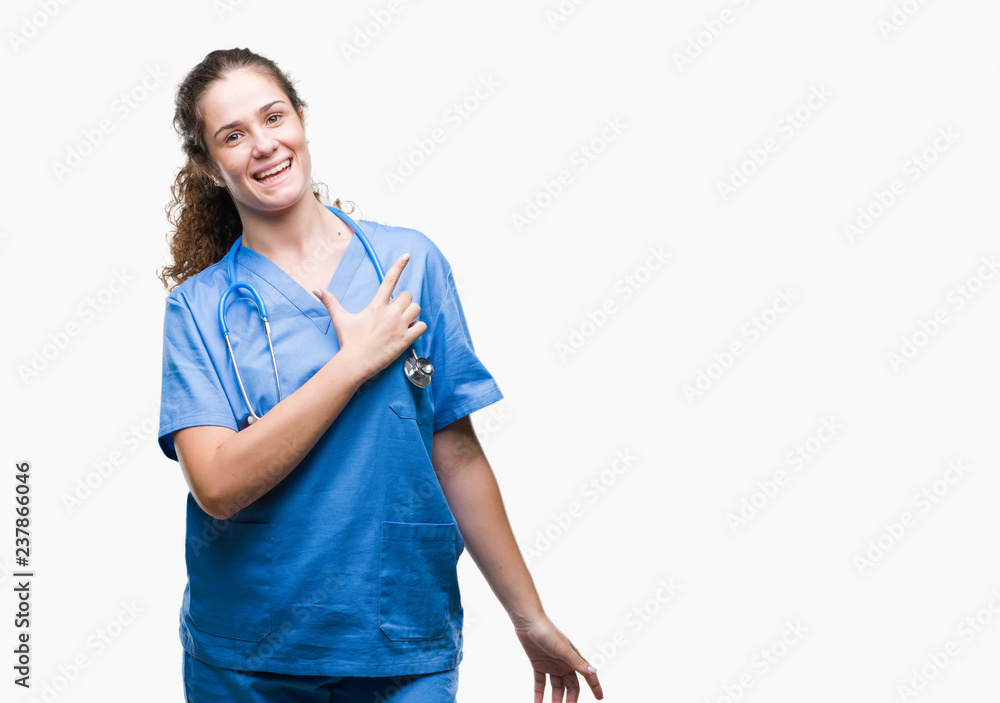 Young brunette doctor girl wearing nurse or surgeon uniform over isolated background cheerful with a smile of face pointing with hand and finger up to the side with happy and natural Young brunette doctor girl wearing nurse or surgeon uniform over isolated background cheerful with a smile of face pointing with hand and finger up to the side with happy and natural
