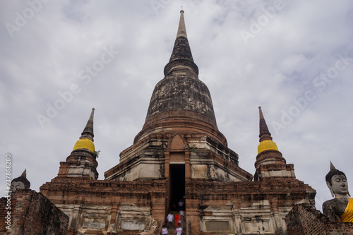 Old Ancient Temple. The statue old Buddha and ancient pagoda at Wat Yai Chaimongkol Ayutthaya Thailand.